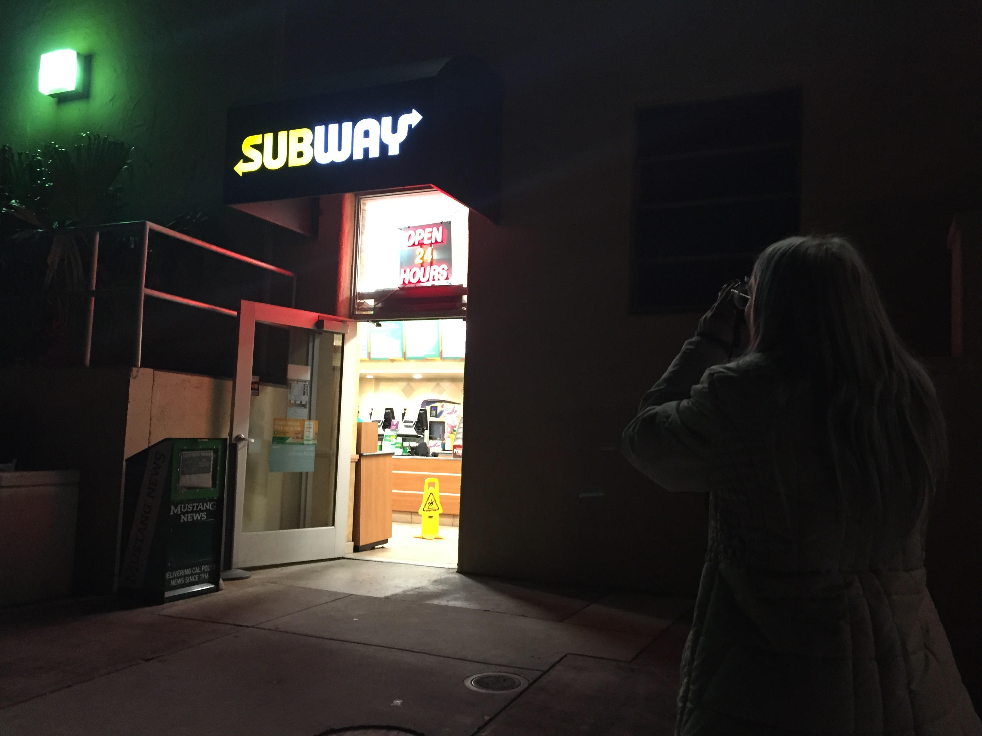 Shelby takes a picture of Cal Poly's Subway