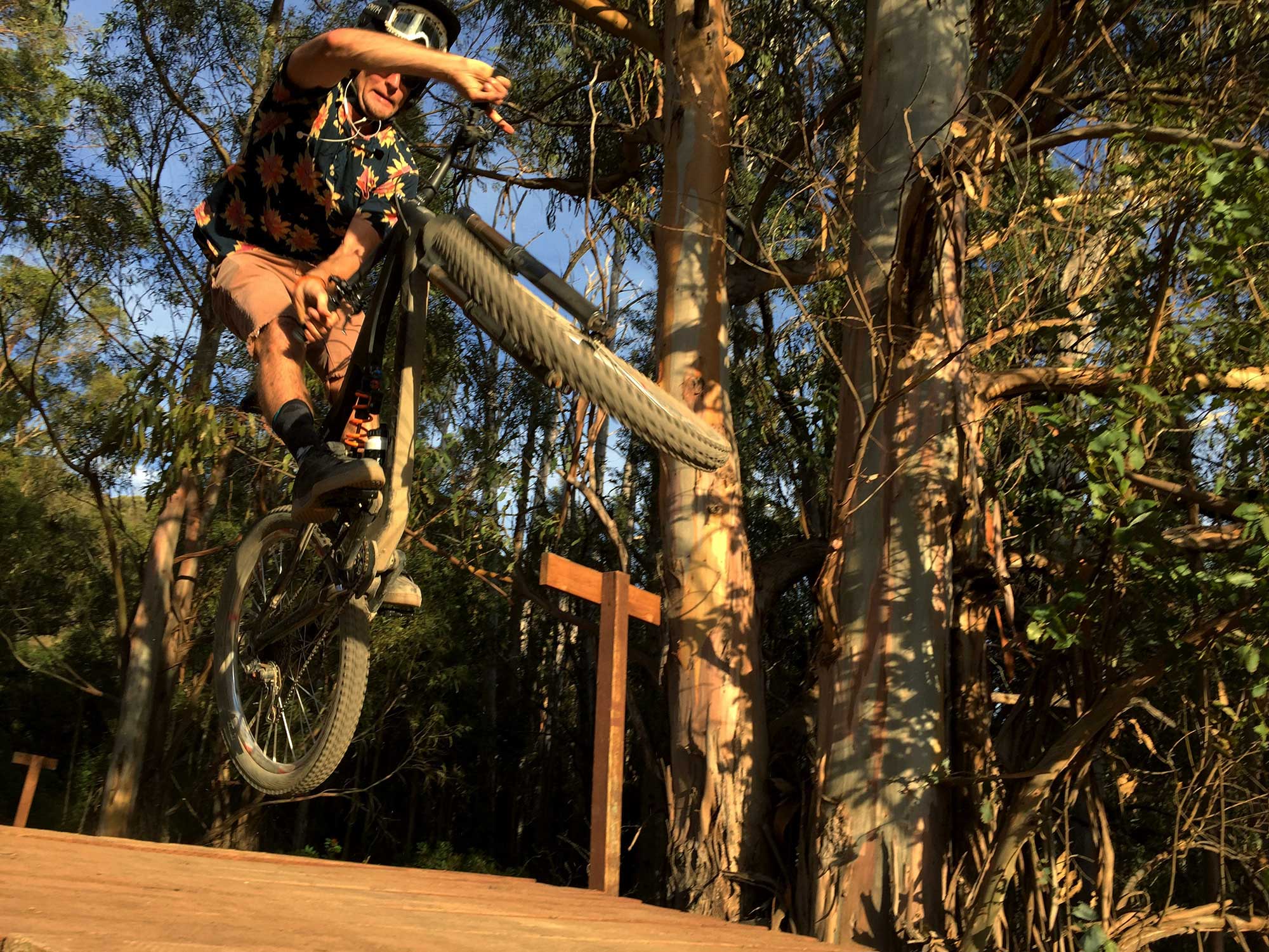 Oct. 7, 2016 – Trevor Roland, a Cal Poly Cycling alumni, performs a bar twist in The Eucs section of Poly Canyon. The Eucs is designated for San Luis Obispo’s mountain bikers. It features flow trails, elevated wooden platforms, and jumps. In Roland’s words, 'Hawaii Friday is all smiles. This ride is something else.'