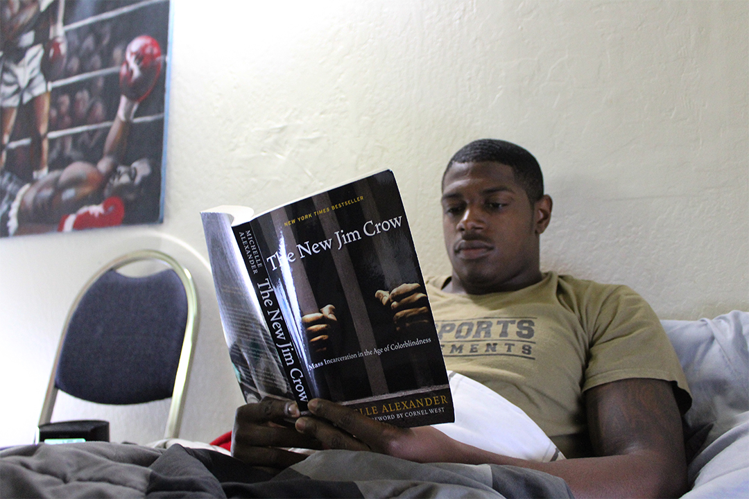 Once he gets home from late workouts, he makes dinner and starts on homework. Before going to bed every night, he reads
at least one chapter from a book. His current read is “The New Jim Crow”, by Michelle Alexander. Since coming to college
Kitu, has found himself drawn to learning more about his culture and black history. 
