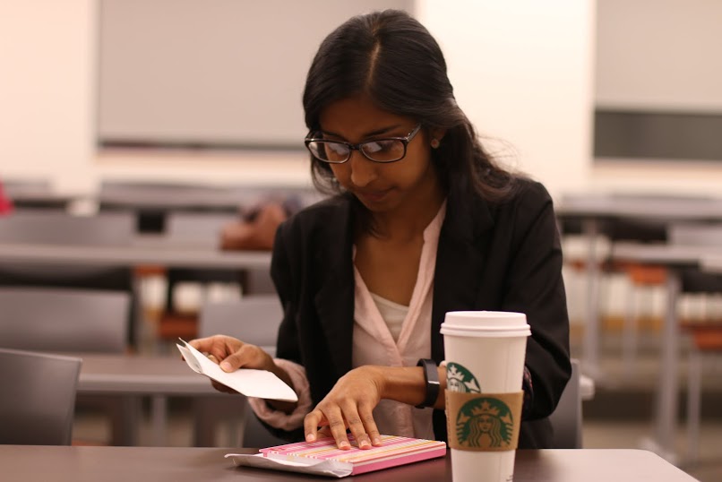 Anuja Argade, a Recreation, Parks, Tourism & Administration 2nd-year and VP of Her Campus Cal Poly, finishes updates at a club meeting on the chapter’s future partnerships with other campus clubs, including Real Food Collab and Triota, Cal Poly’s feminist activist group.