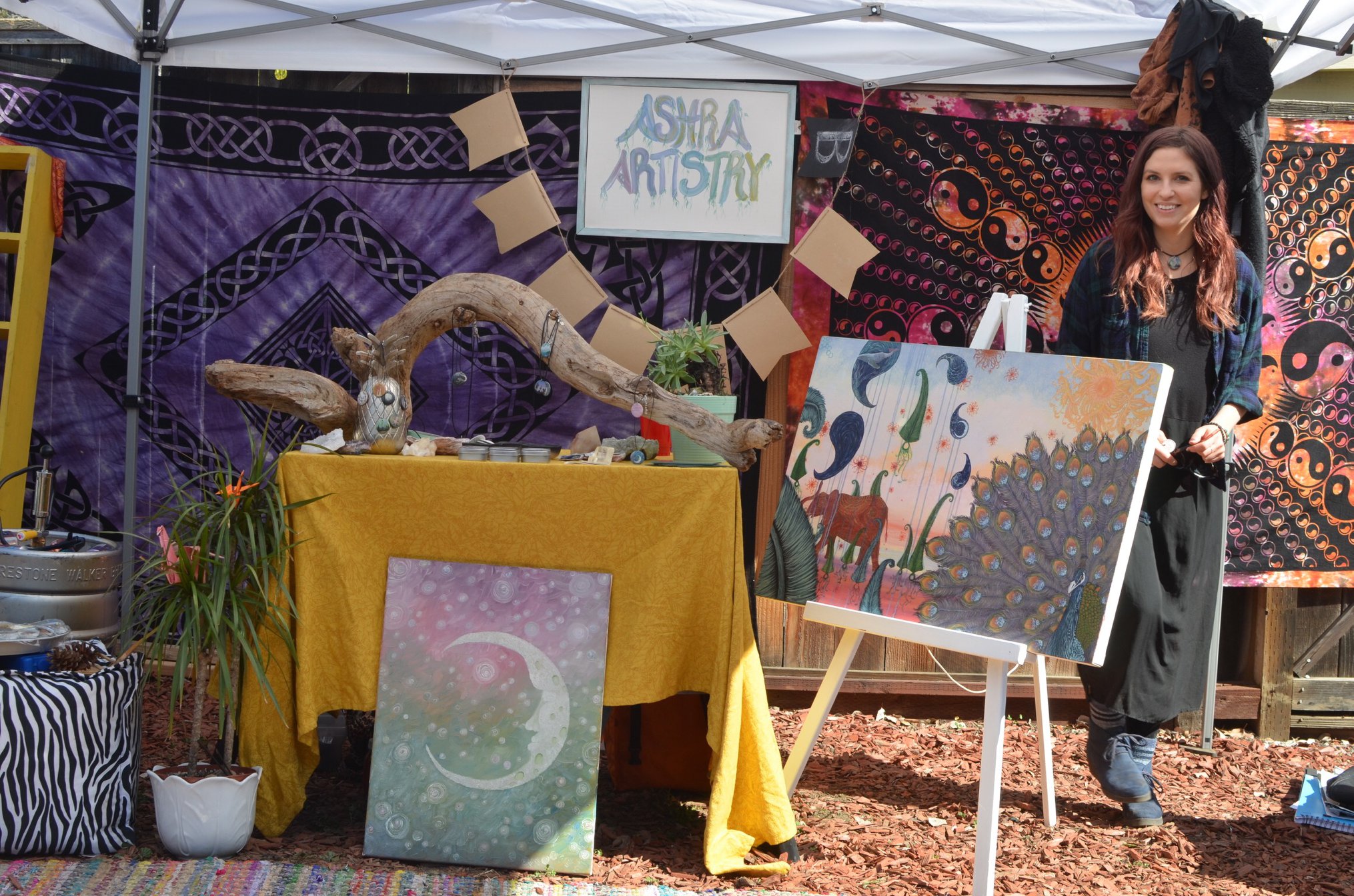 Ashra Artistry is an organization that creates, “miniature art for the whimsical heart”. Pictured above is the Ashra Artistry booth set up at the SubSessions Backyard Pop-up shop on March 18, 2018. 
 Photo Credit: Carter Harrington