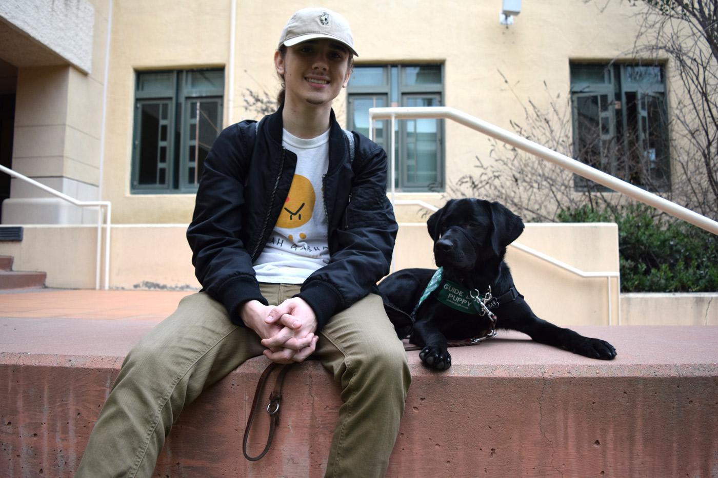 “I just wanted to find a way that I could have a dog on campus. The only two ways are either getting an emotional support animal or getting a service dog. If it’s an emotional support, they can only go certain places, but service dogs, you’re allowed to take anywhere. I learned about Guide Dogs for the Blind and I realized it was a really good cause. “We created a really good bond...even if I’m alone, I’m not really alone because he’s right there,” philosophy sophomore Jake Riggs said. Photo Credit: Sydney Brandt