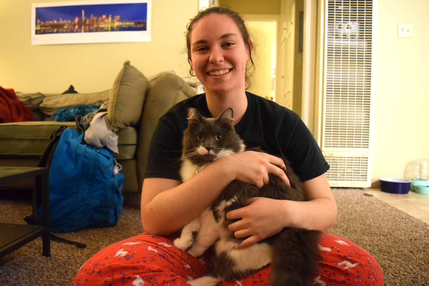 “I have anxiety as a result of my ADHD and I tend to get really stressed out even in like normal day-to-day situations, like doing homework or if I have a lot of things on my plate. Otter he comes and sits in my lap when I’m doing homework at night...it makes me feel a lot calmer and think ‘okay I can do this,’” animal science sophomore Ophir Sayfan said. Photo Credit: Sydney Brandt